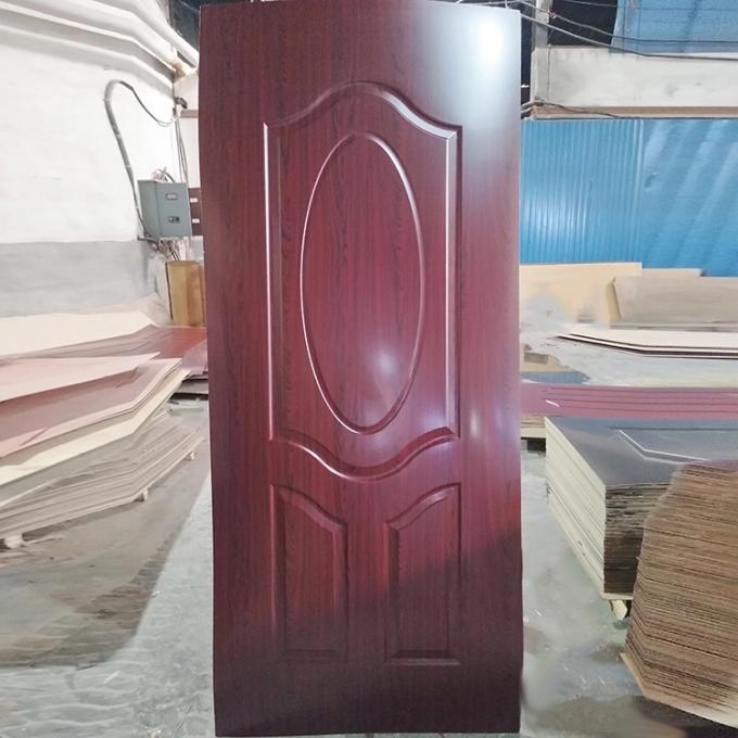 Pelli di legno rosso scuro dell'impiallacciatura della porta a livello, appartamento facendo uso delle pelli di plastica della porta del PVC